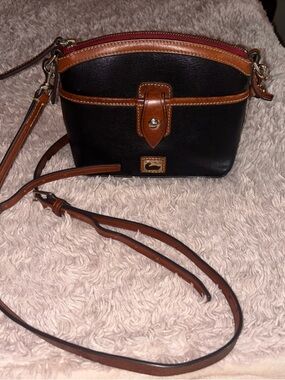 Dooney & Bourke Black with Brown Trim Pebbled Leather Crossbody